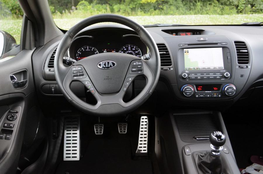  Kia Forte Koup SX 2014 года  (фото 22 из 36)
